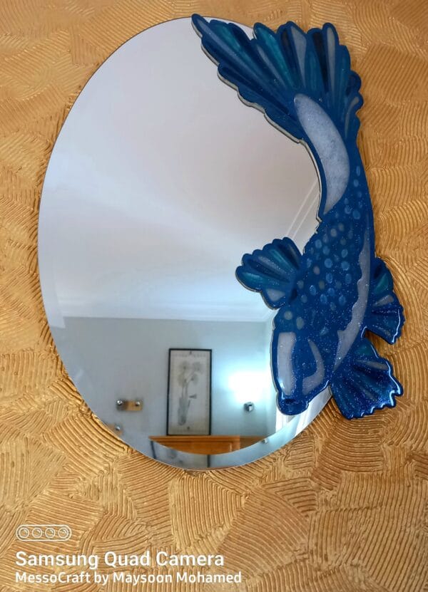 Oval mirror with wooden fish filled with resin