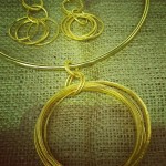 Attached bangles pendant with matching earring 1 small