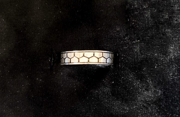 Sterling silver ring with black enamel.