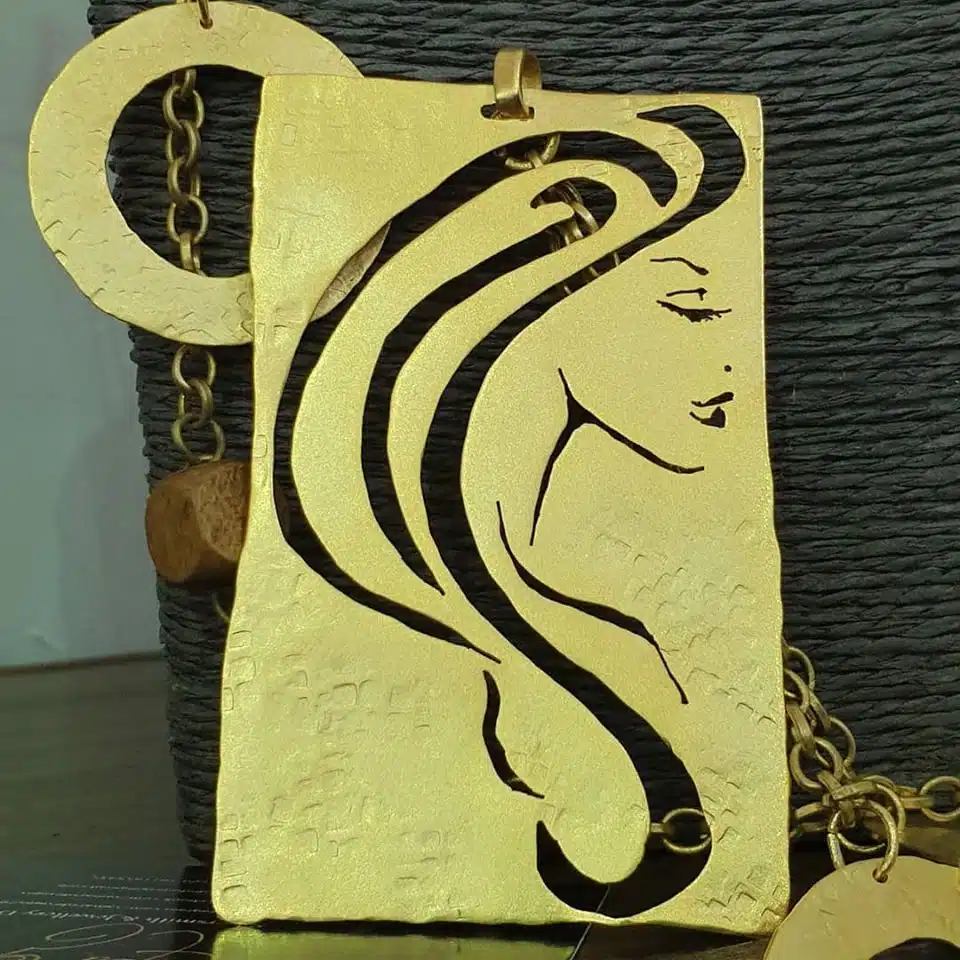 Girl face necklace 2 Double faced hammered girl face 1