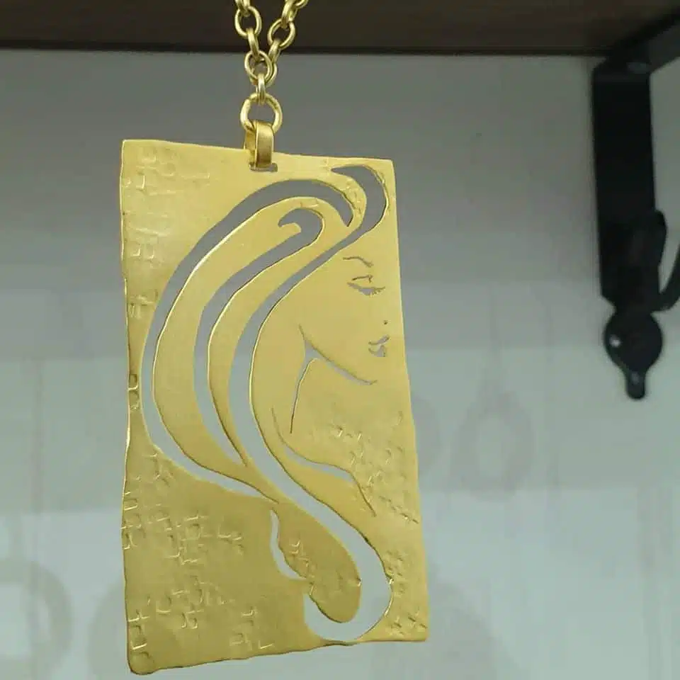 Girl face necklace 3 Double faced hammered girl face 3