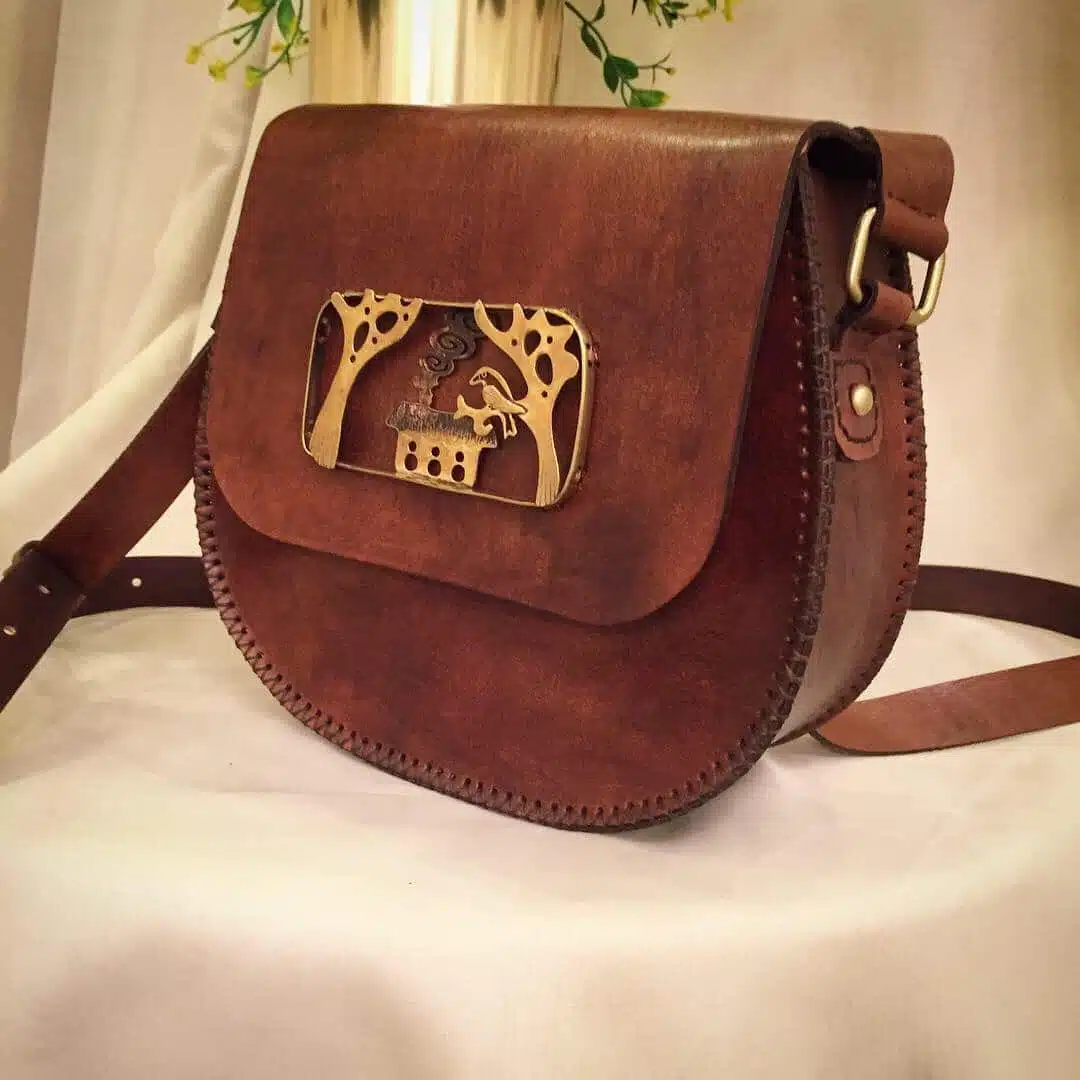 0102 Handmade Genuine leather cross bag with handmade copper figure 1 0102 Handmade Genuine leather cross bag with handmade copper figure