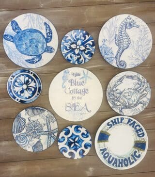 Decoupaged wall plates with summer design and theme