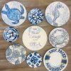 Decoupaged wall plates with summer design and theme