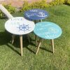 Wooden set of round tables for summer