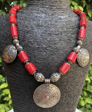 Natural Red Coral Necklace with Siwa Oasis Silver Charms - Handcrafted Artistic Masterpiece . "عقد مرجان أحمر طبيعي مزين بدلايات من تراث واحة سيوة - تحفة فنية يدوية"
