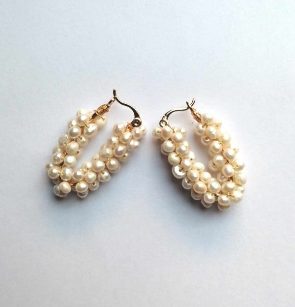 Gold plated earring with natural pearls