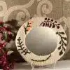 Floral rounded mirror frame