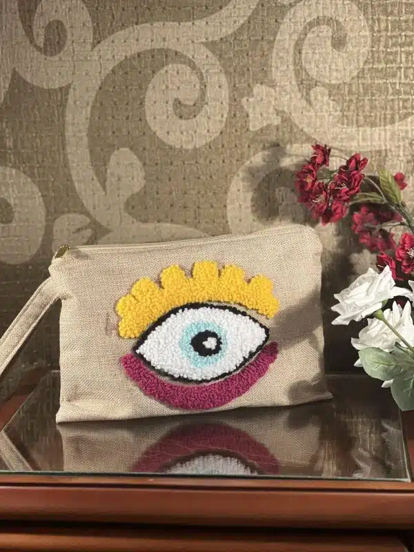Colorful evil eye jute clutch