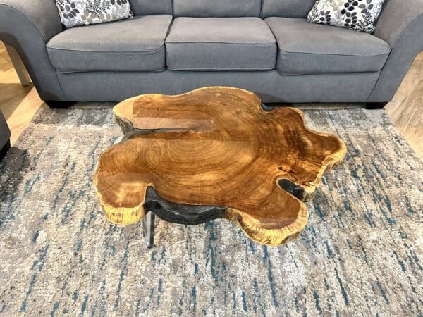 live edge couch table with cracks filled with grey epoxy