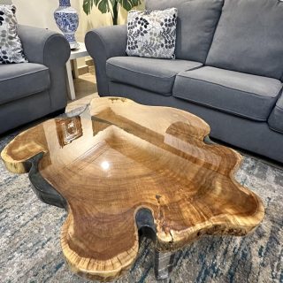 live edge couch table with cracks filled with grey epoxy