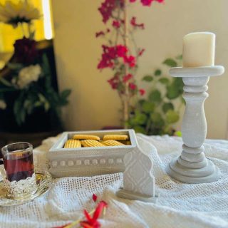 Decorative set of small tray, candle holder and small decorative stand.