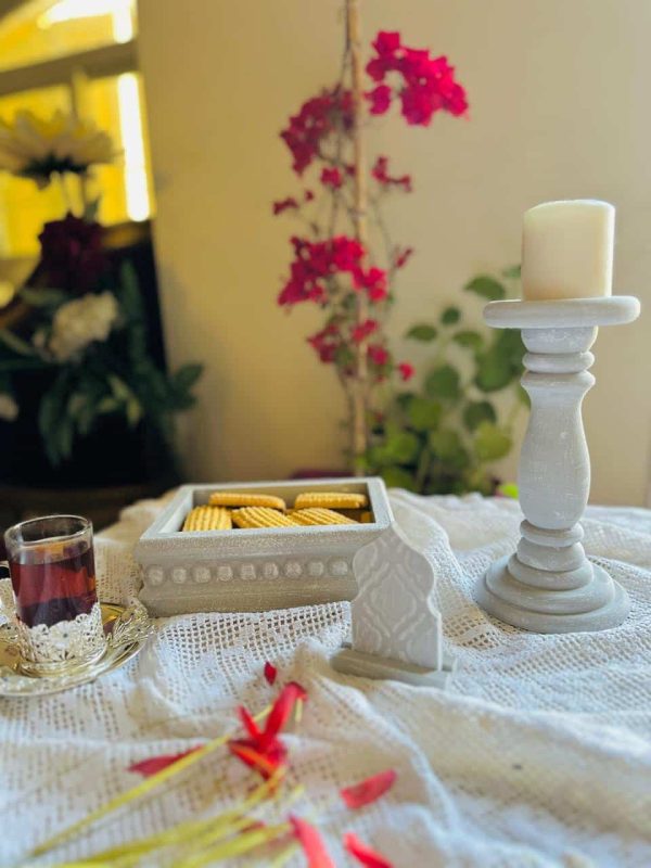 Decorative set of small tray, candle holder and small decorative stand.