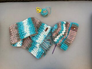 Set of matching crochet scarf and icecap