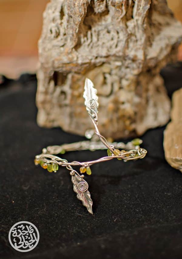 a beautifully nature inspired handmade leave bracelet flexiable with peridot and citrine gemstone