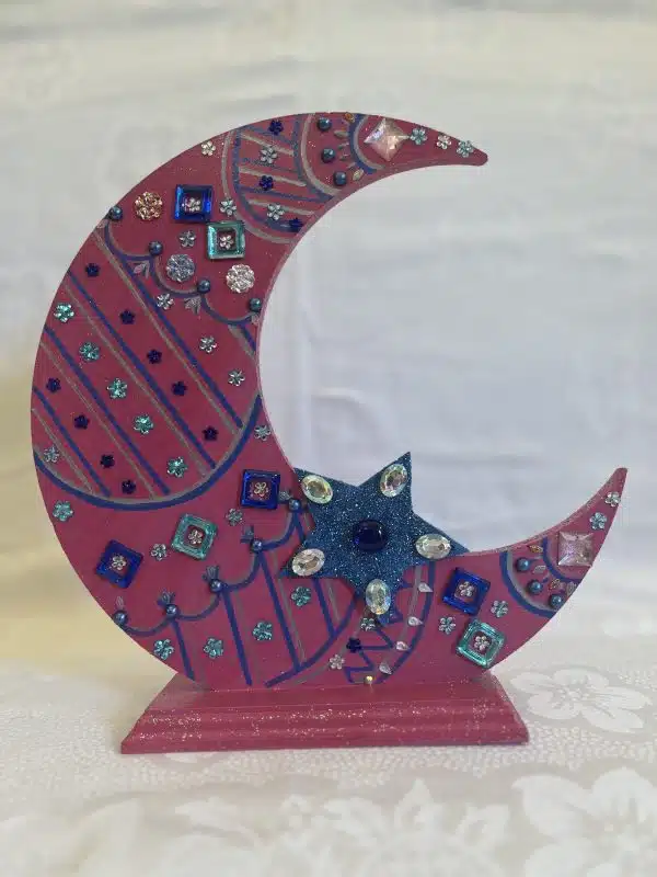 Pink colored wooden crescent