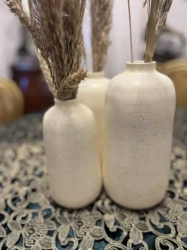 Triplet off white vase set