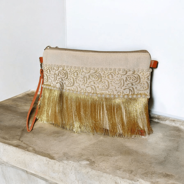 Beige clutch with golden fringes & arabic calligraphy