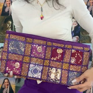 purple embroidered clutch