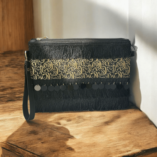 Black clutch with golden arabic calligraphy