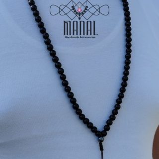 a rosary of 99 onyx stones