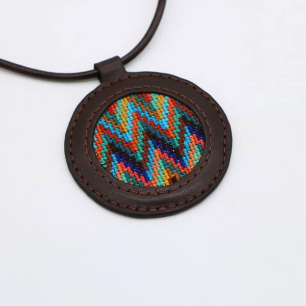 Genuine leather necklace with colorful Cross-stitching.