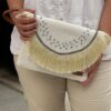 Off white summer clutch with round flap