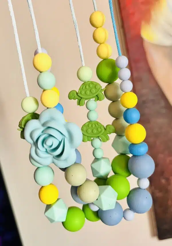 Teething, silicone beads necklaces, sold separately.