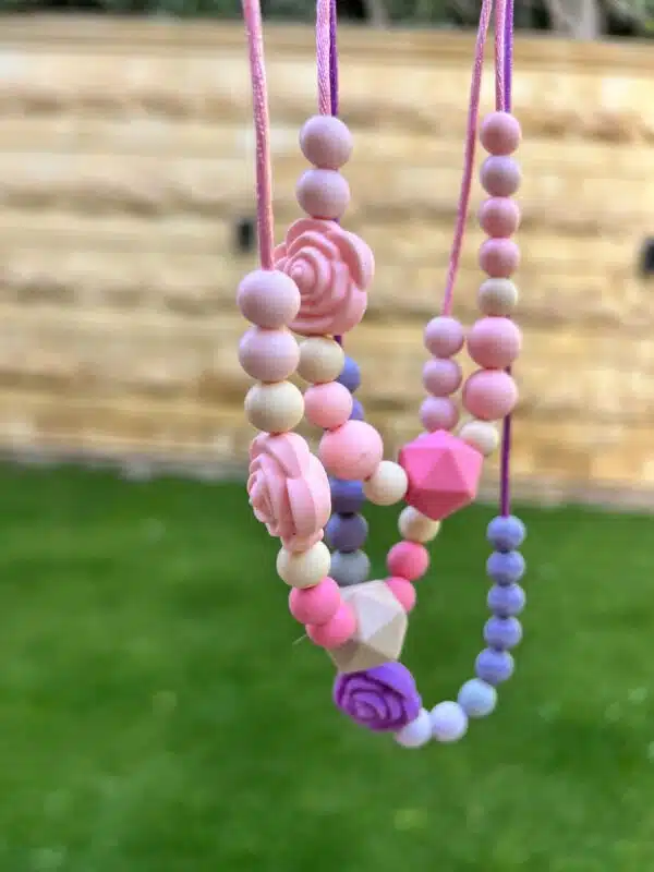 For little girl, silicone beads necklaces, sold separately.