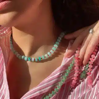 handmade necklace made using button shaped beads of blue agate stones with tiny red glass beads. trending chunky beaded necklace for summer