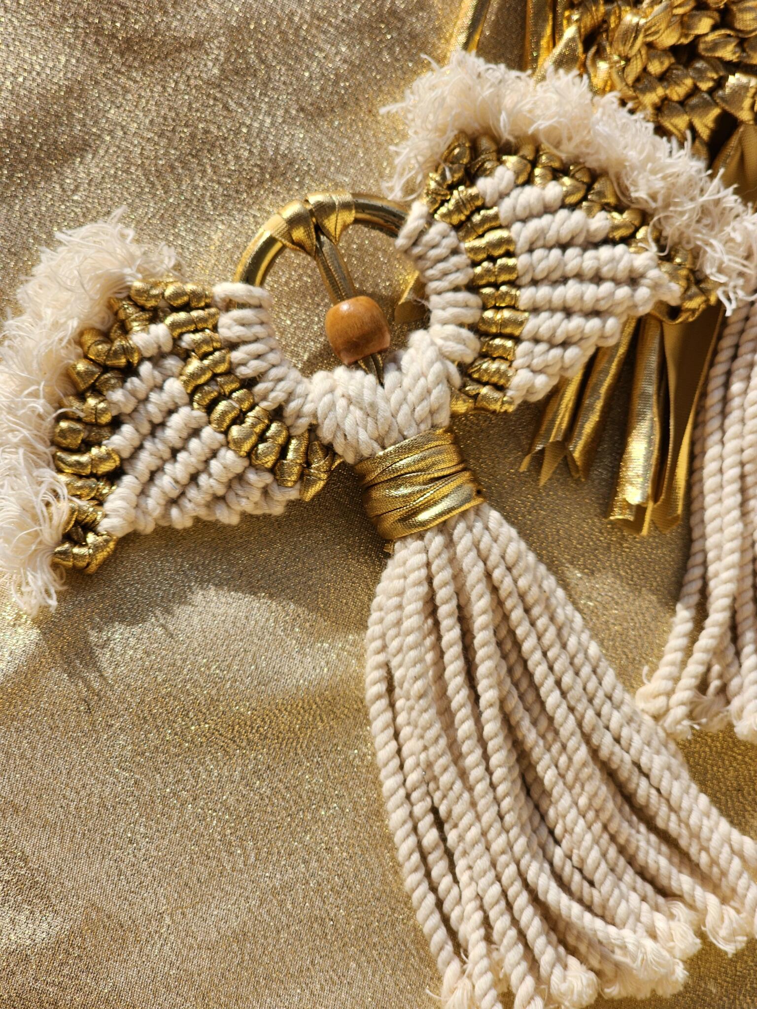 Gold and white macrame Christmas angel. 1 Gold and white macrame Christmas angel.