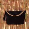 black velvet hand bag with golden metal strap