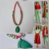 Green | Red necklace with engraved green gemstone