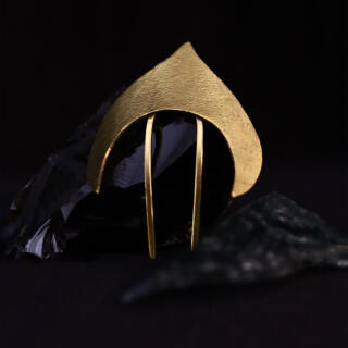 The Angel brass headpiece, not gold plated.