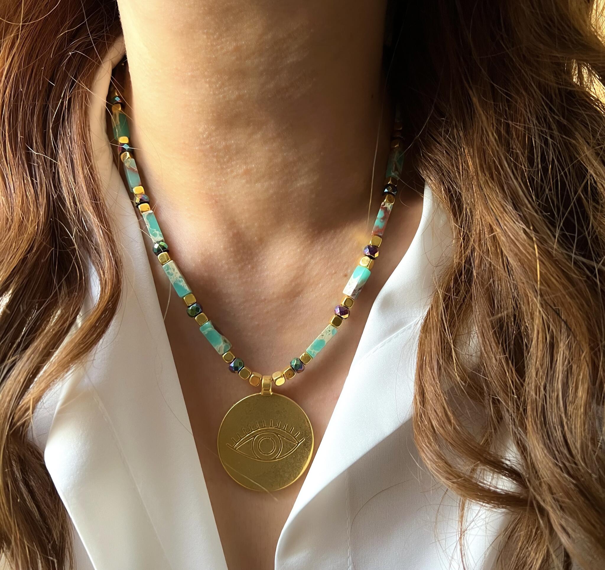 Golden evil eye necklace 2 F5E1D283 4ED1 48DA A1E2 270DA6EA6DFD scaled