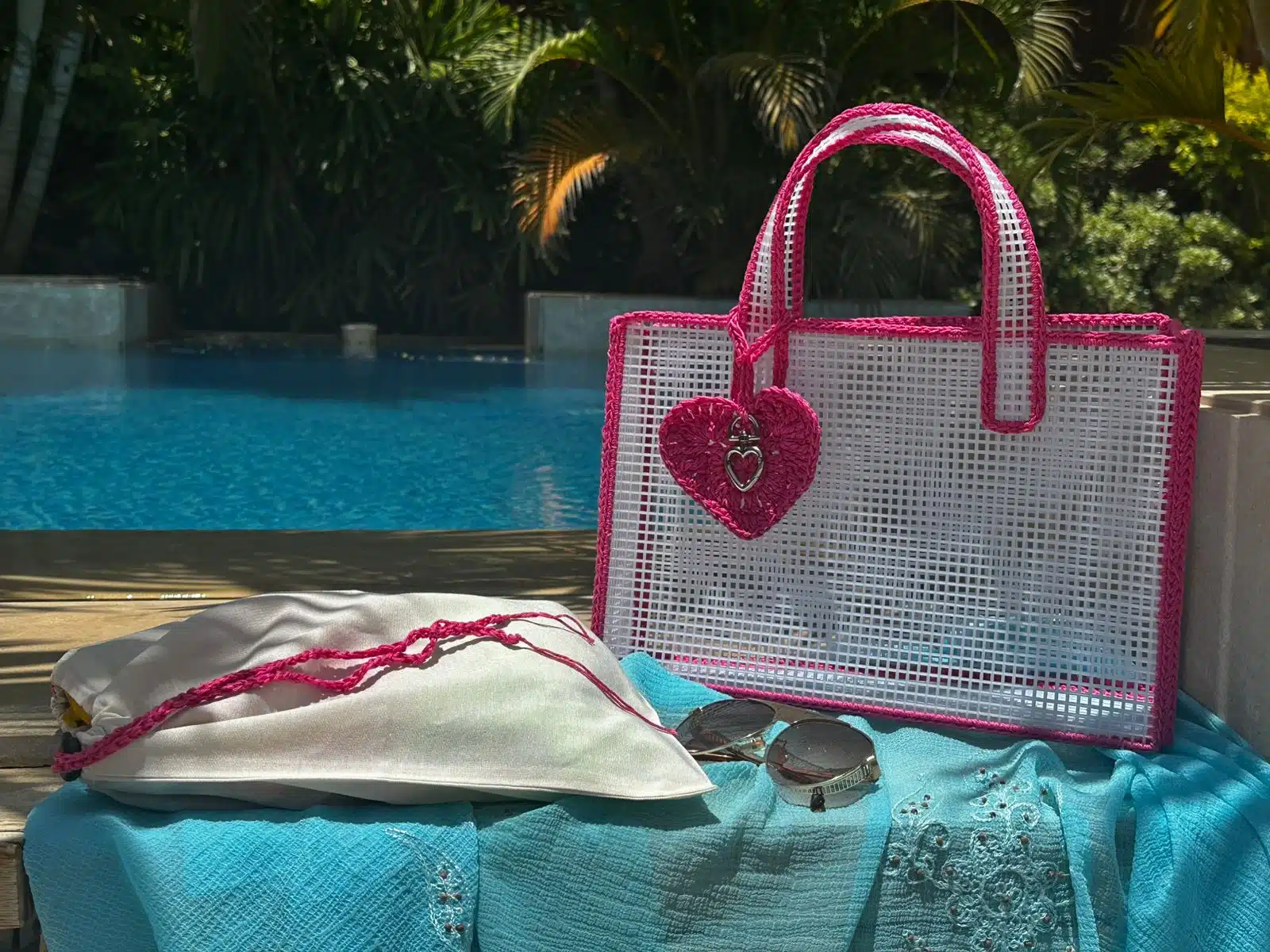 See through white beach bag with pink crochet finish 1 See through white beach bag with pink crochet finish