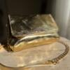Gold cross/hand/waist bag
