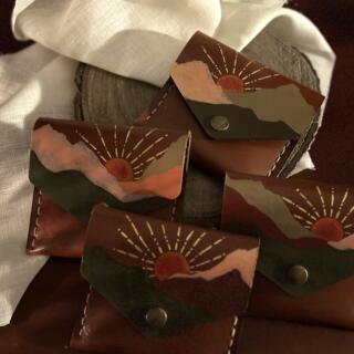 Small handmade natural leather card holder with a hand-painted Sinai-inspired by sunset and mountain illustration; product name: Sinai