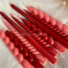 3 red and pink candle sticks