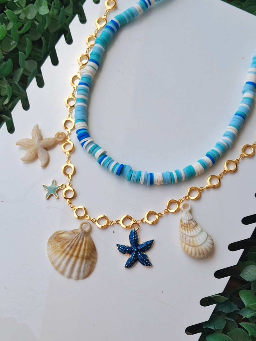 2-layered sea blue necklace. 1 2-layered sea blue necklace.