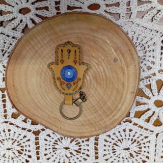 Home 159 ميداليه جلد طبيعي كف لون اصفر