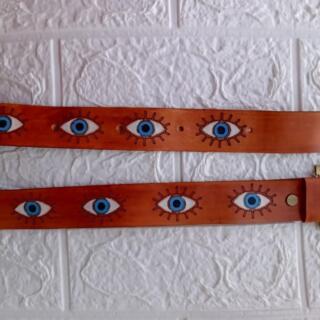 حزام جلد طبيعي عيون