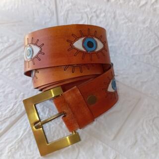 حزام جلد طبيعي برسمه عيون