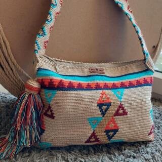 Rectangular beige tapestry crossbody bag with colorful triangle patterns, handmade design.