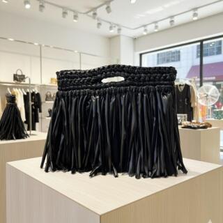 Metallic black fringe bag