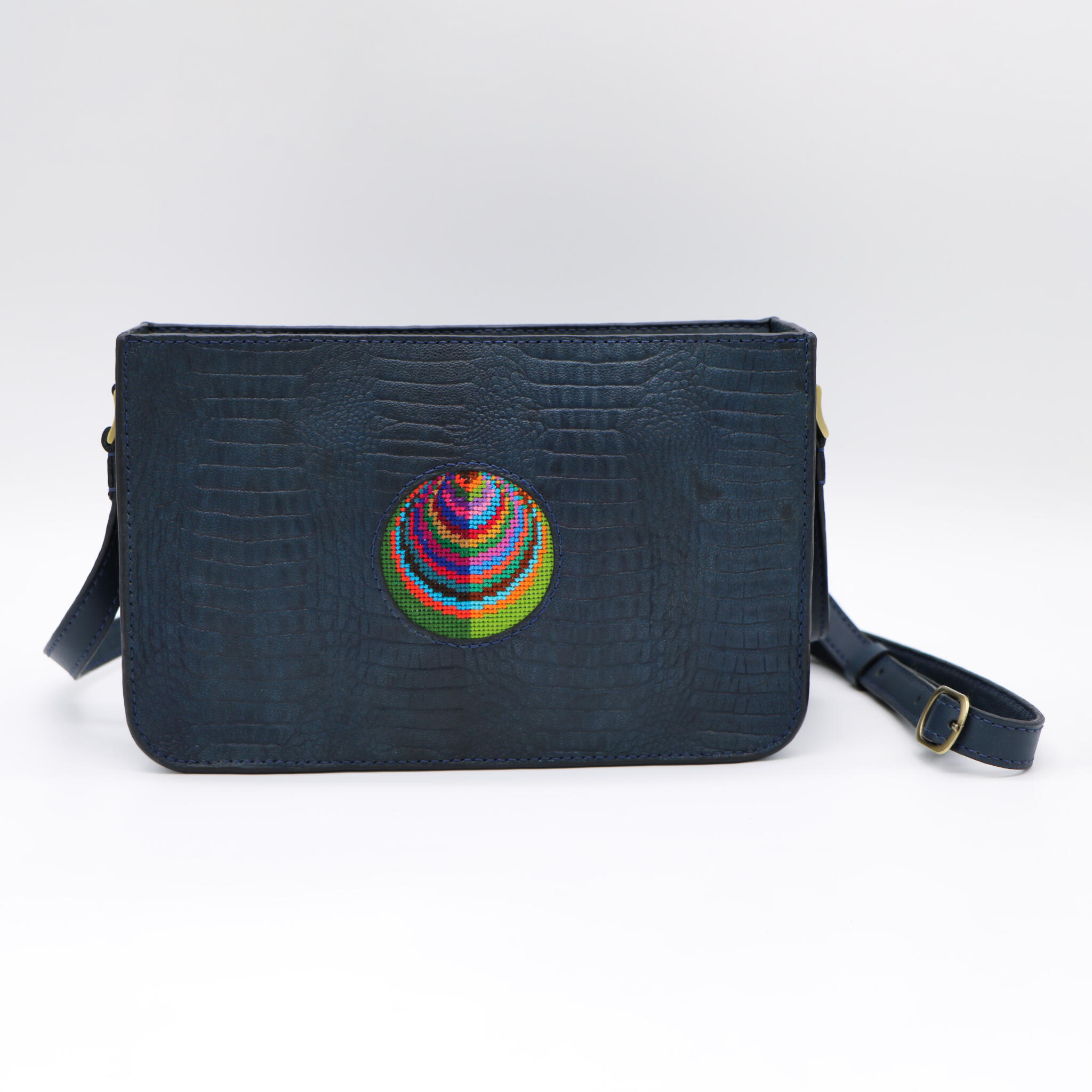 Dark blue genuine leather bag with colorful Cross stitching. 1 Dark blue genuine leather bag with colorful Cross stitching.