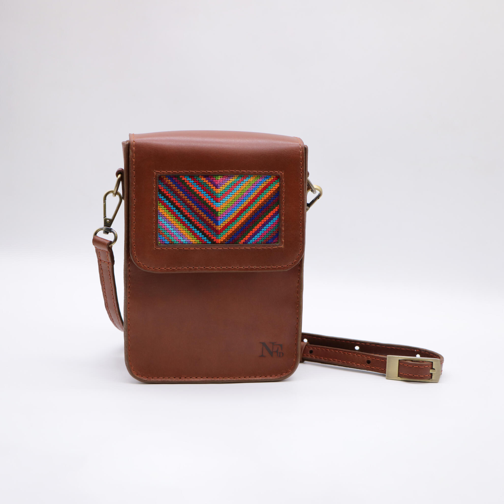 Havana genuine leather bag with colorful cross-stitching. 1 Havana genuine leather bag with colorful cross-stitching.