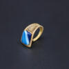 Brass ring with blue agate gemstone.