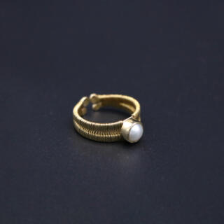 Handmade wire wrapped brass ring with pearl.