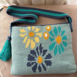 Handmade colorful tapestry crochet laptop bag, designed with a vibrant mix of colors.